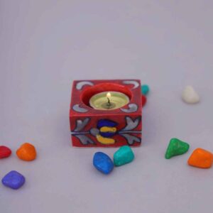 Hand-Painted Blue Pottery Diya / Candle Holder – Traditional Decorative Design “Hand-painted blue pottery diya in red with colorful floral design, crafted by Kanhaiya Handicrafts.”